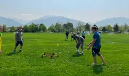 a park with a group of employees